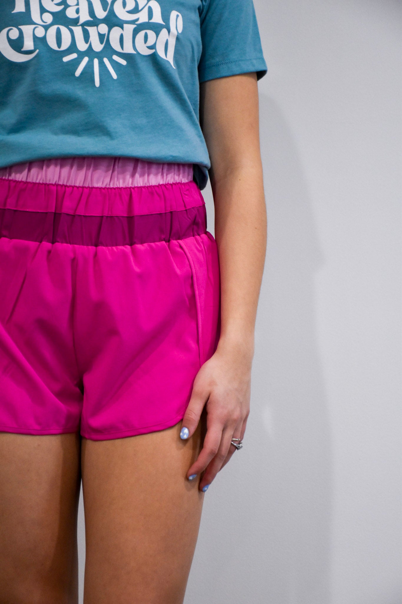 Front view of the Color Blocked Active Wear Shorts in fuchsia