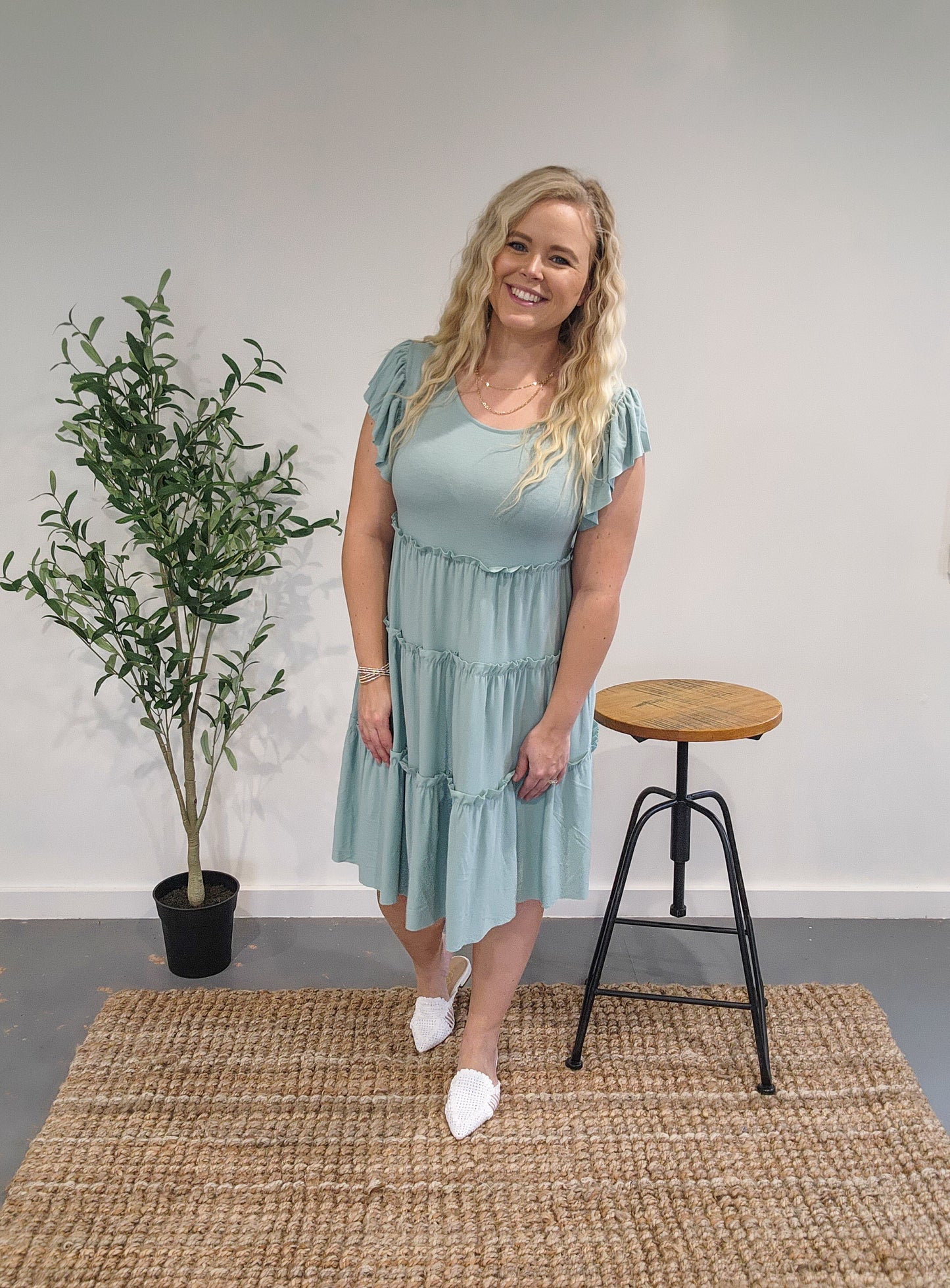 Front view of the ruffle sleeve tiered dress in Dusty Green